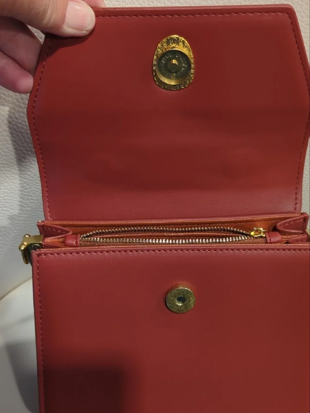 Elegant Rust Top-Handle Crossbody Bag with Gold Accent